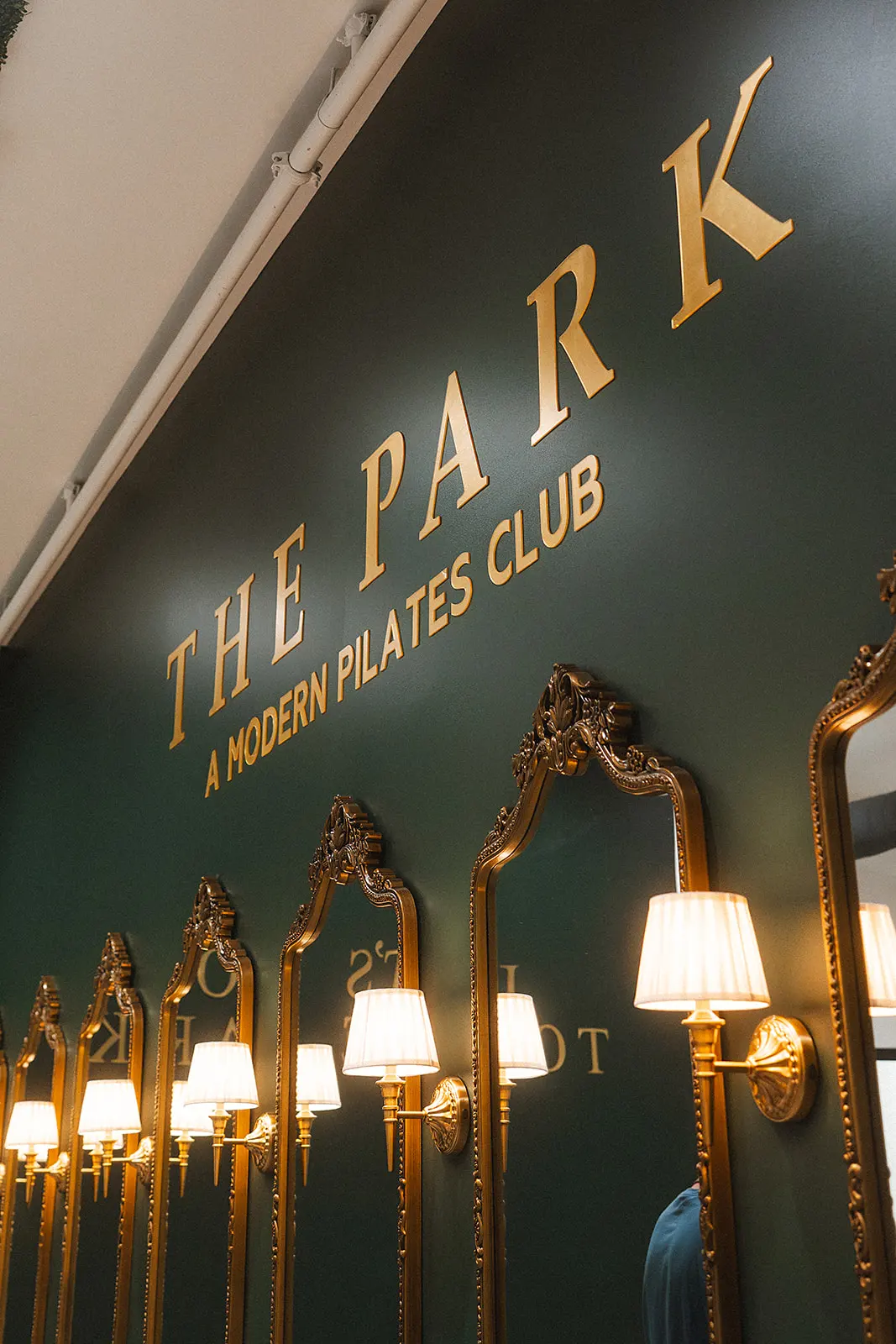 Gold mirrors and sconces